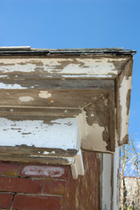 Close-up of deterioration along the wood trim 